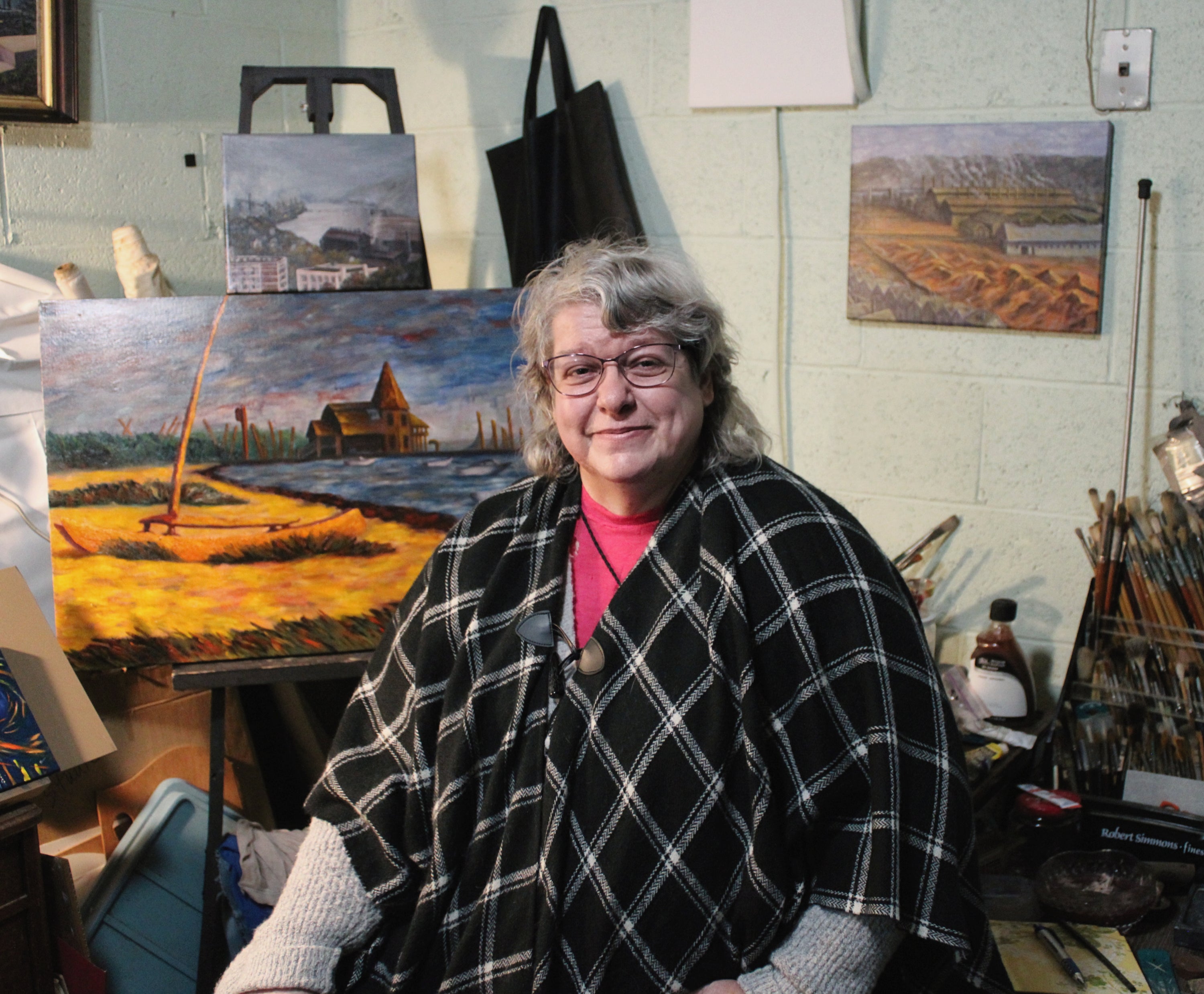 Me in my studio with some of my paintings.